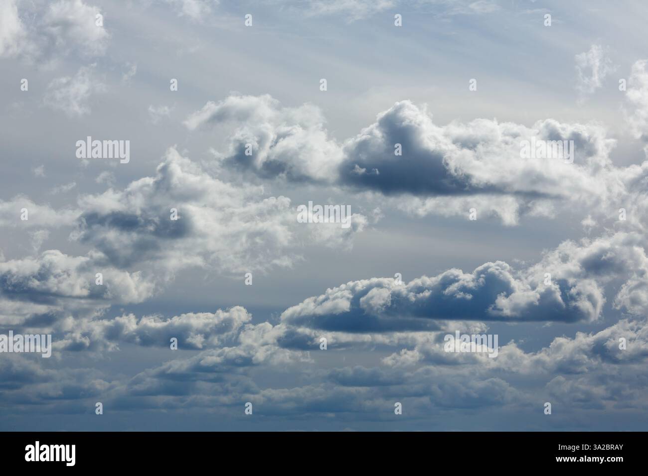 A sky filled with dark and light clouds creating a dramatic and