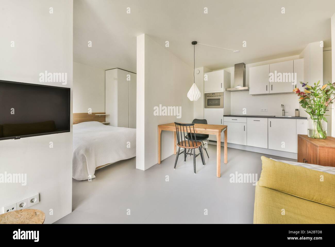 A bright and airy modern interior showcasing minimalist design elements ...