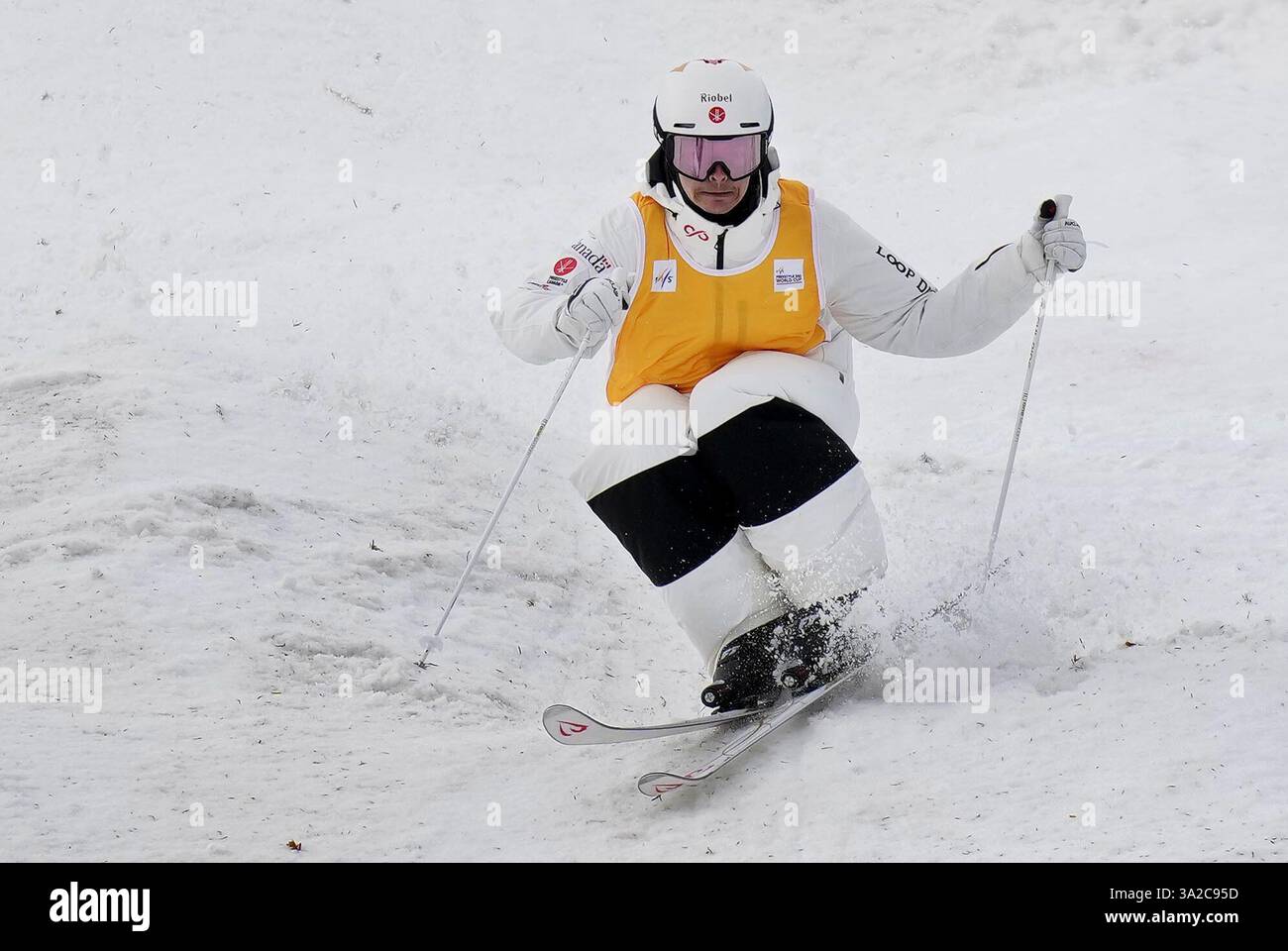 Canadian freestyle skier Mikael Kingsbury competes en route to winning gold in the World Cup men