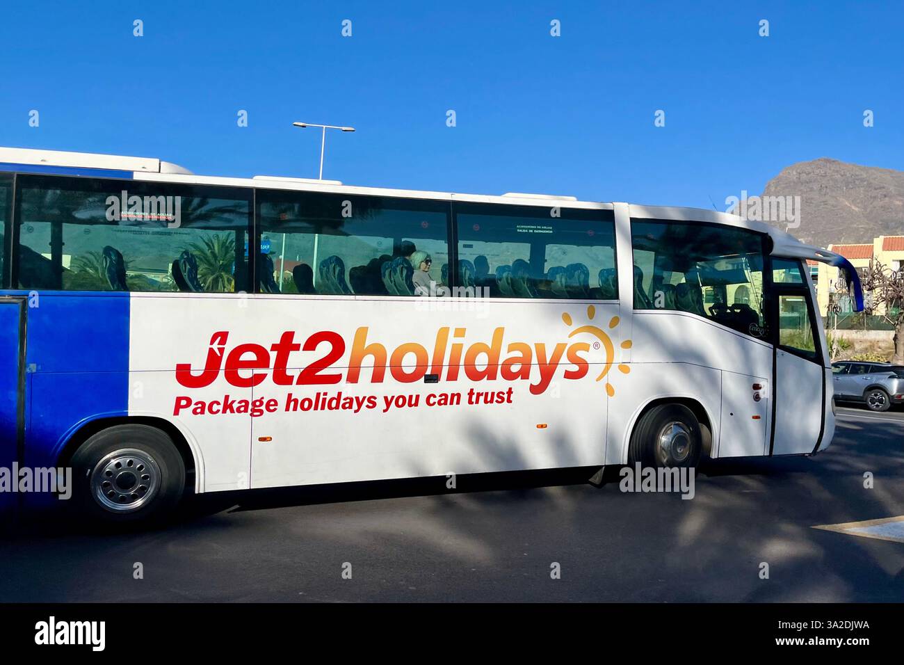 Jet2holidays Transfer Coach driving through Costa Adeje. Tenerife, Canary Islands, Spain. 31st January 2025. - Smartphone Captured Stock Image