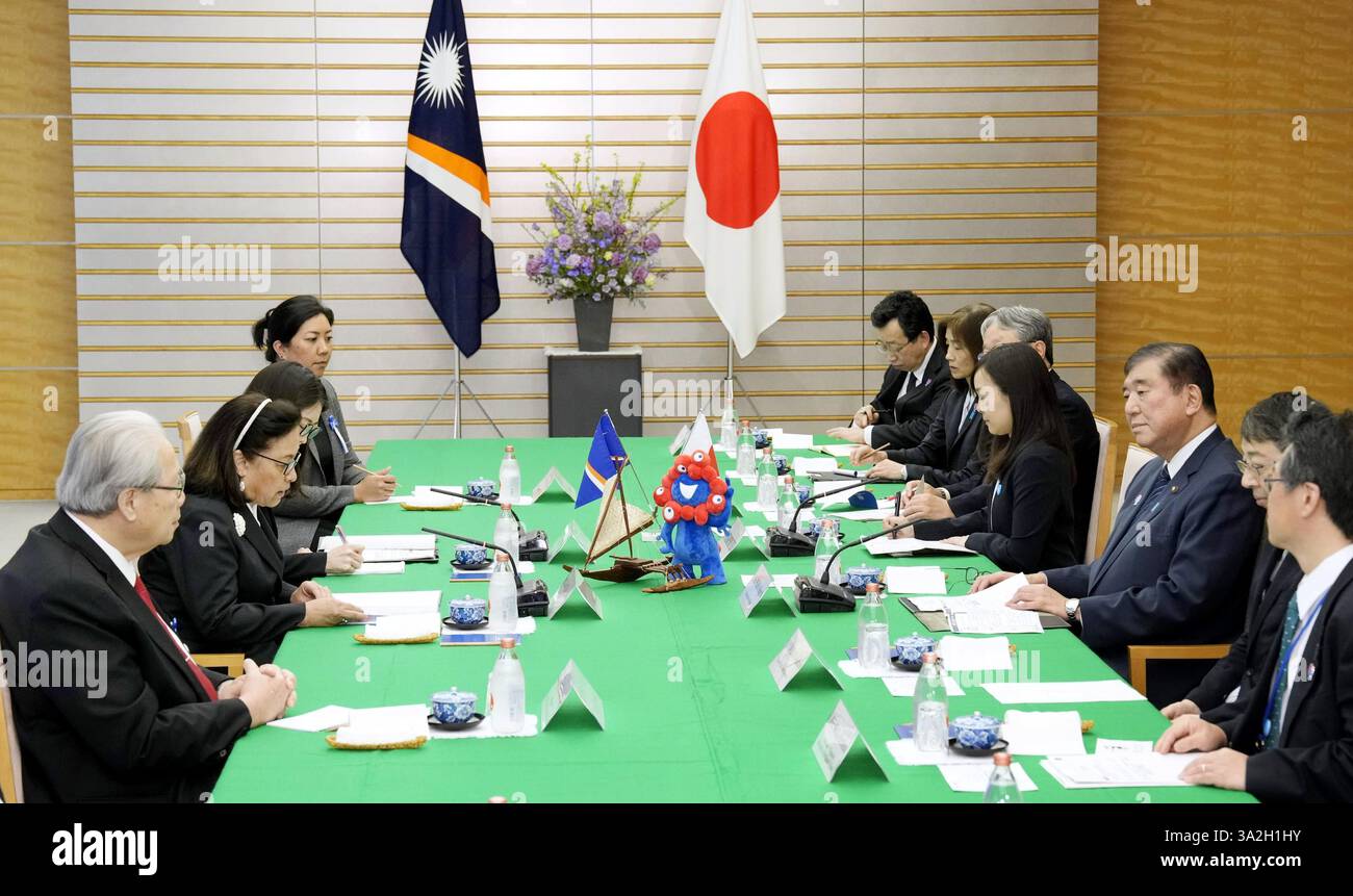 Japanese Prime Minister Shigeru Ishiba (3rd from R) holds talks with