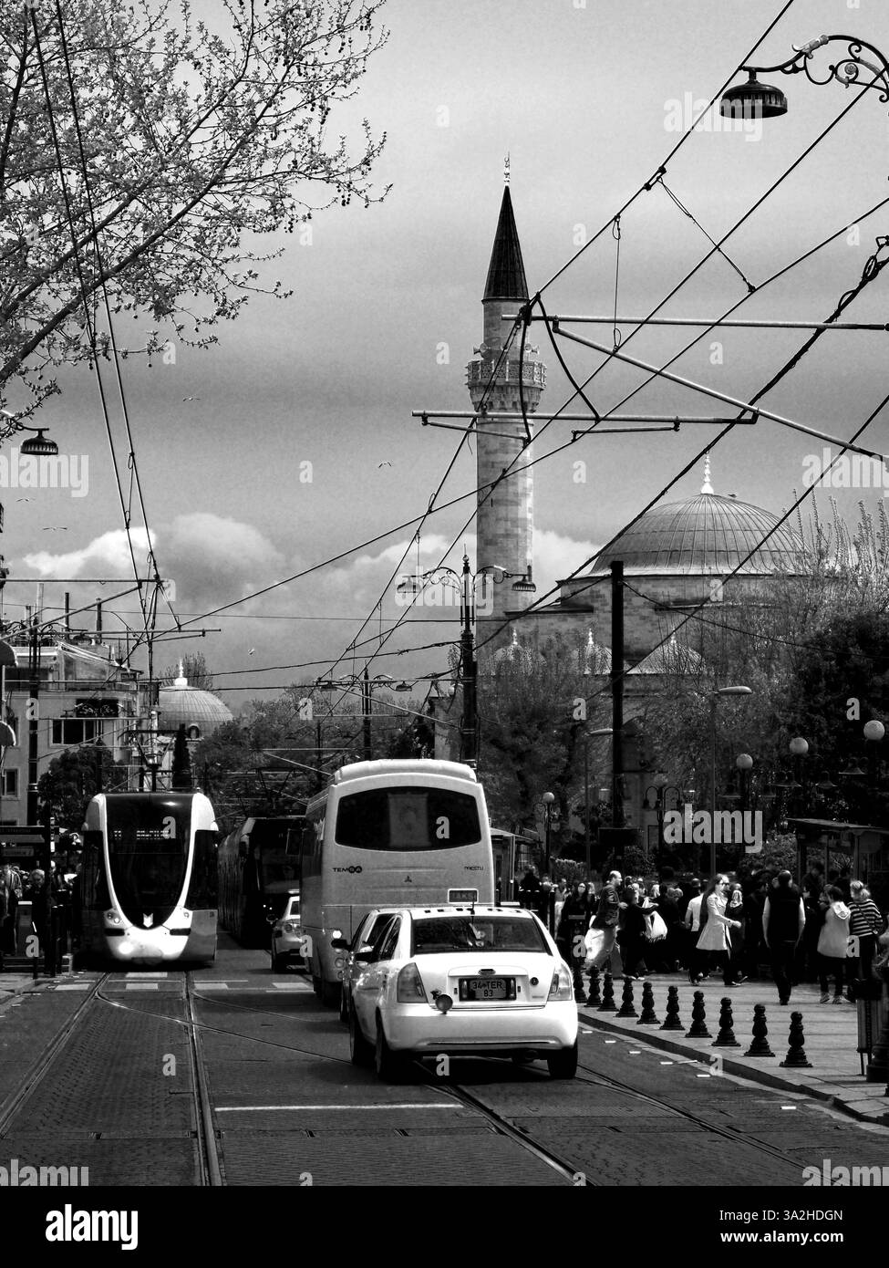 Jan. 18, 2012 - ISTANBUL - Apr 21: trams, buses and taxis going past Atik Ali Pasa mosque on Divan yolu near Grand Bazaar on April 21, 2013,  Istanbul, Turkey (Credit Image: © Igor Golovniov/ZUMA Wire/ZUMAPRESS.com) Stock Photo