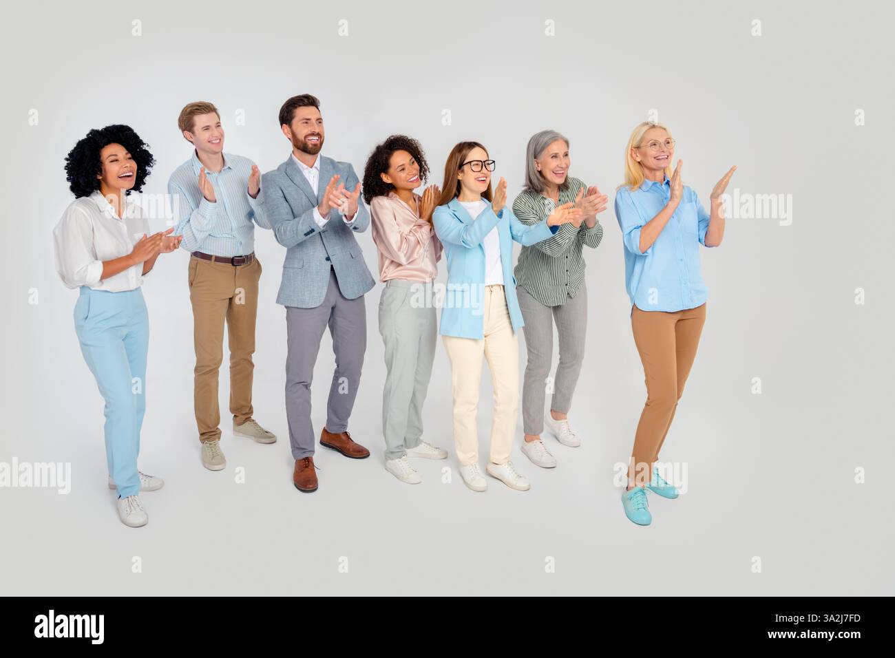 Diverse Group of Business Professionals Standing Together in Formal ...