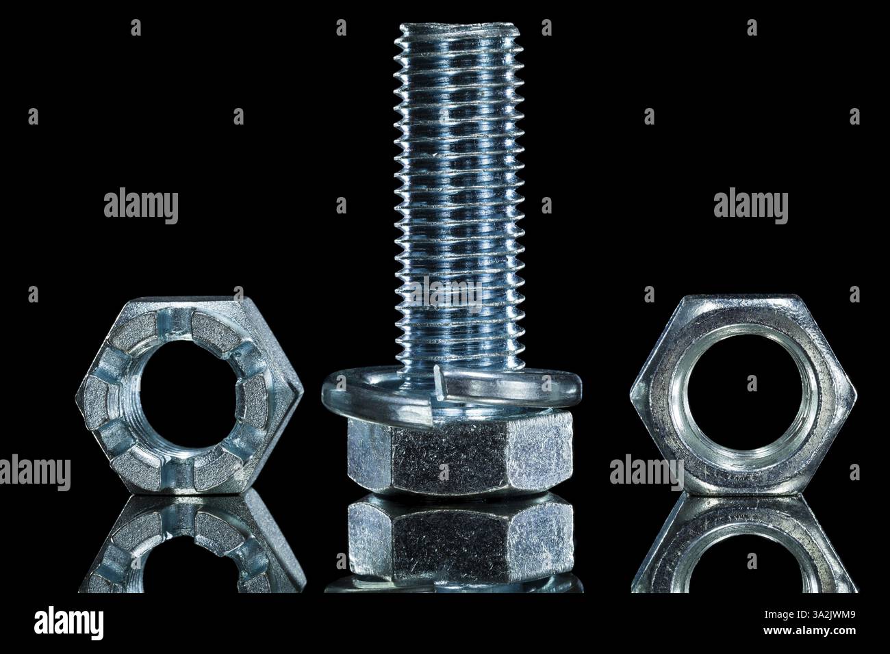 Threaded construction crown nut screwbolt bolt washer on black background Stock Photo