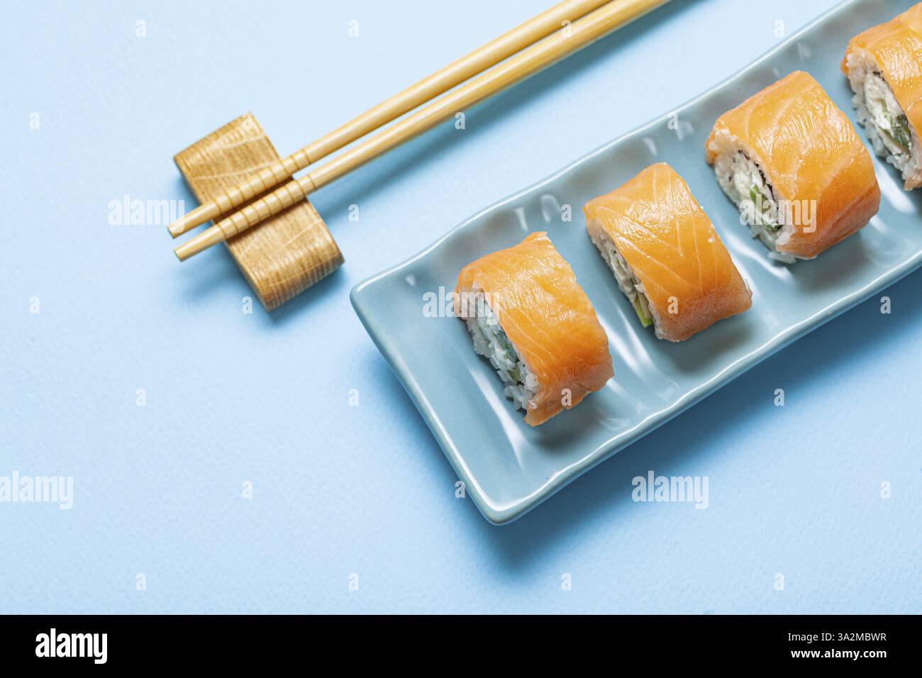 Sushi With Salmon On Blue Rectangular Plate Stock Photo