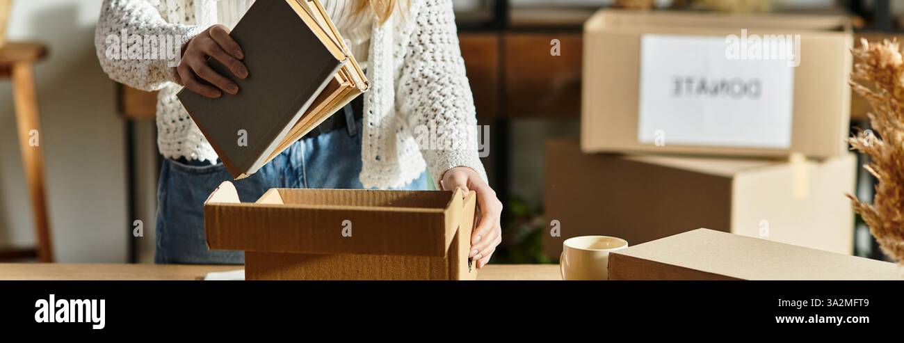 A young woman sorts books for donation, promoting sustainability ...