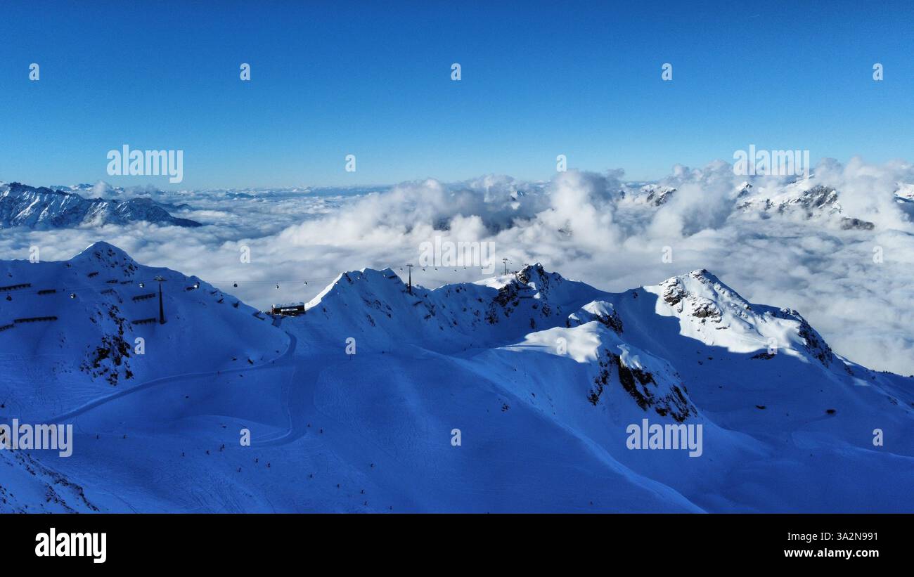 Aerial view of snowy mountains in the Austrian alps Stock Photo - Alamy