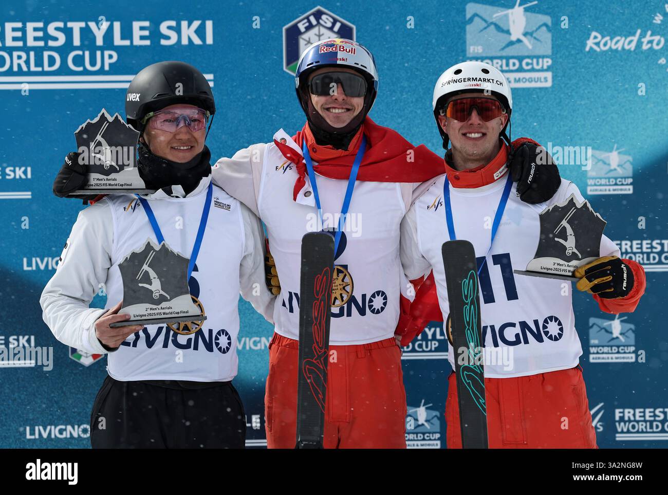 Livigno. 13th Mar, 2025. Gold medalist Noe Roth (C), silver medalist ...