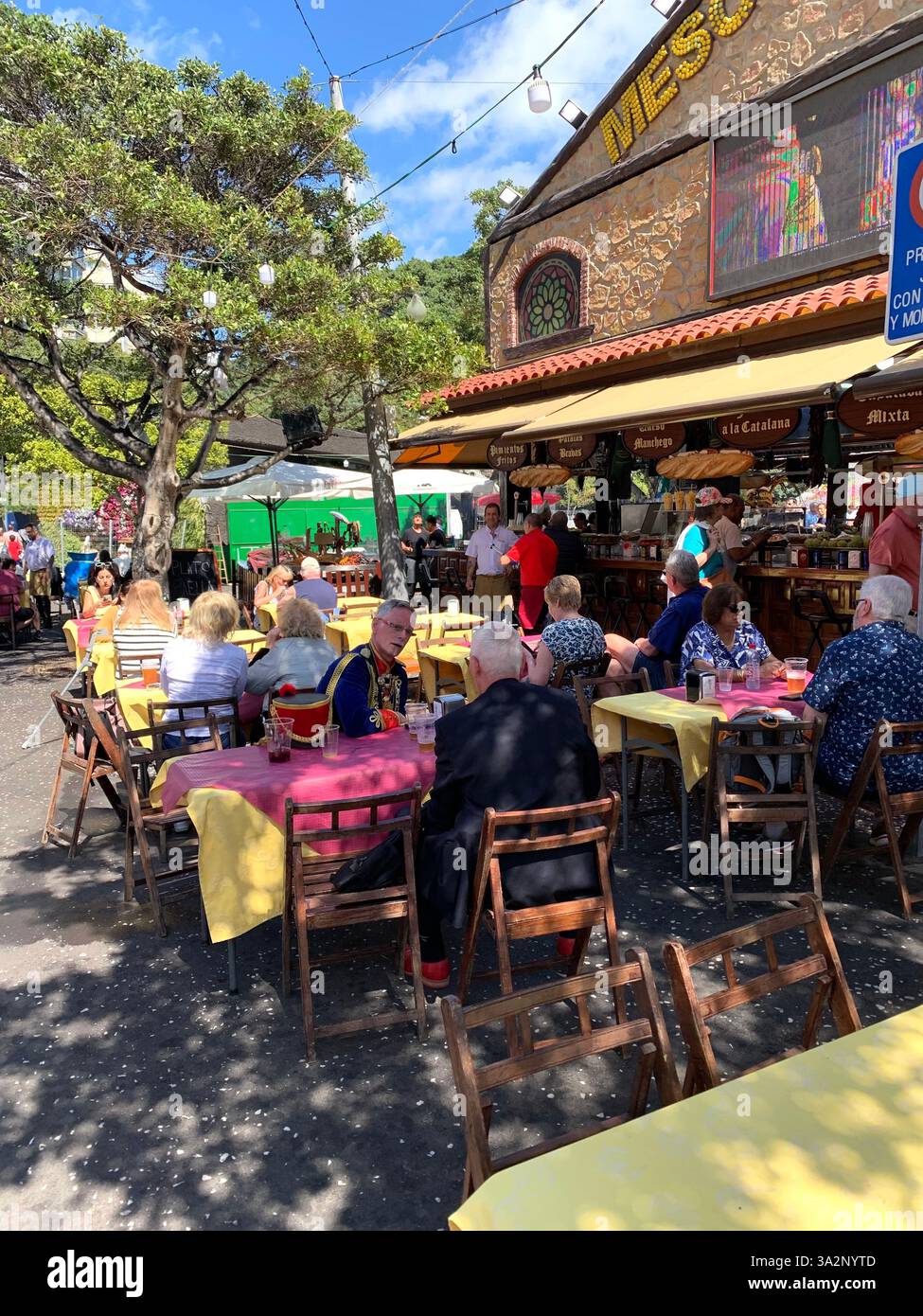 Tenerife Carnival Canary Islands Spain weather hot sunny people happy friendly drink drinking style type tourism tourists restaurant food eating out - Smartphone Captured Stock Image