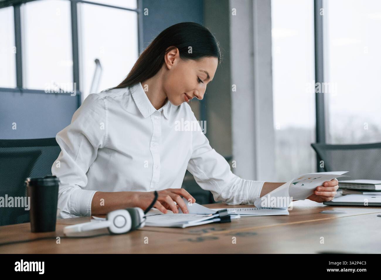 Daily routine work. Businesswoman is indoors in the office Stock Photo ...