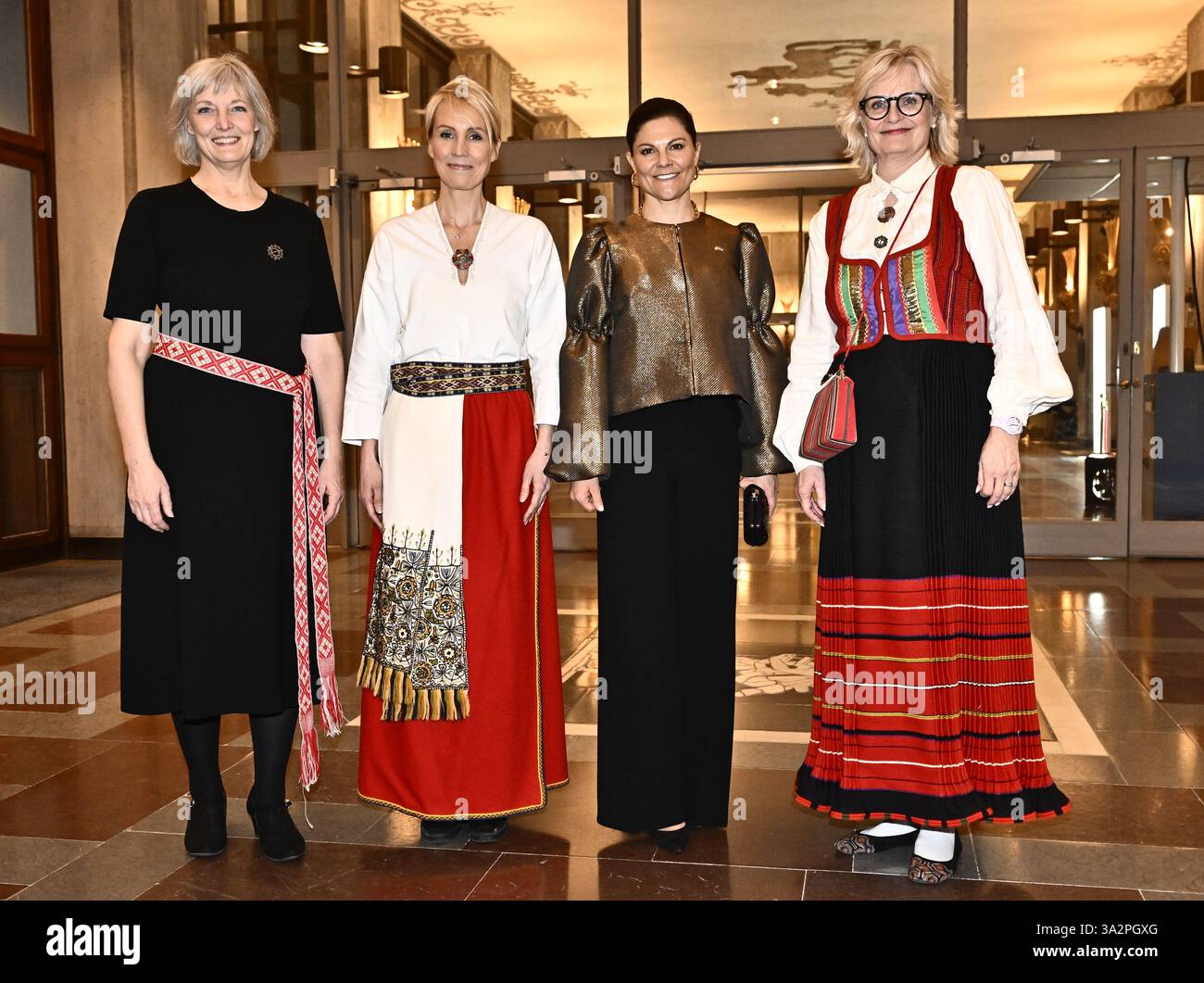 Stockholm, Sweden. 13th Mar, 2025. Crown Princess Victoria is received by Leane Riiser, Mimmi Kask and principal Piia Paljak when the Estonian School in Stockholm, founded on March 15, 1945, celebrates its 80th anniversary with a school concert in Stockholm's Concert Hall in Stockholm, Sweden on march 13, 2025.Photo: Jonas Ekströmer/TT/Code 10030 Credit: TT News Agency/Alamy Live News Stock Photo