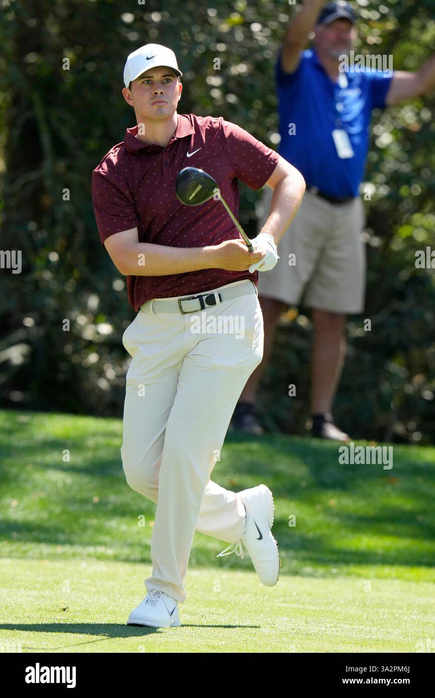 Davis Thompson reacts to his tee shot on the 15th hole during the first round of The Players