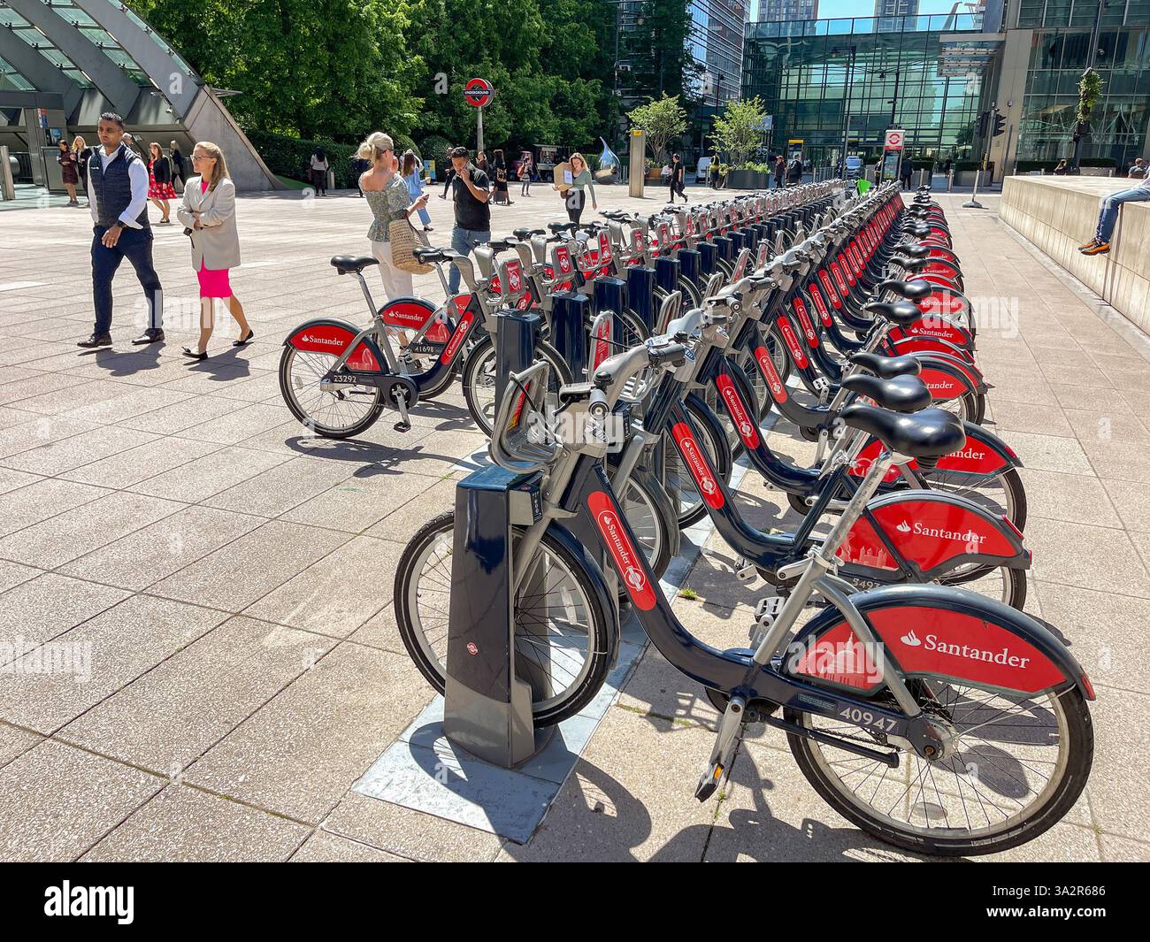 London, England, UK - 22 June 2023: Row of bicycles for rental parked in a parking station in Canary Wharf - Smartphone Captured Stock Image