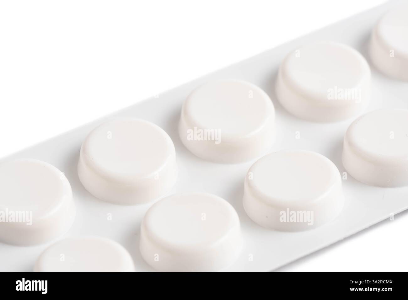 White pills in blister pack isolated on white background Stock Photo