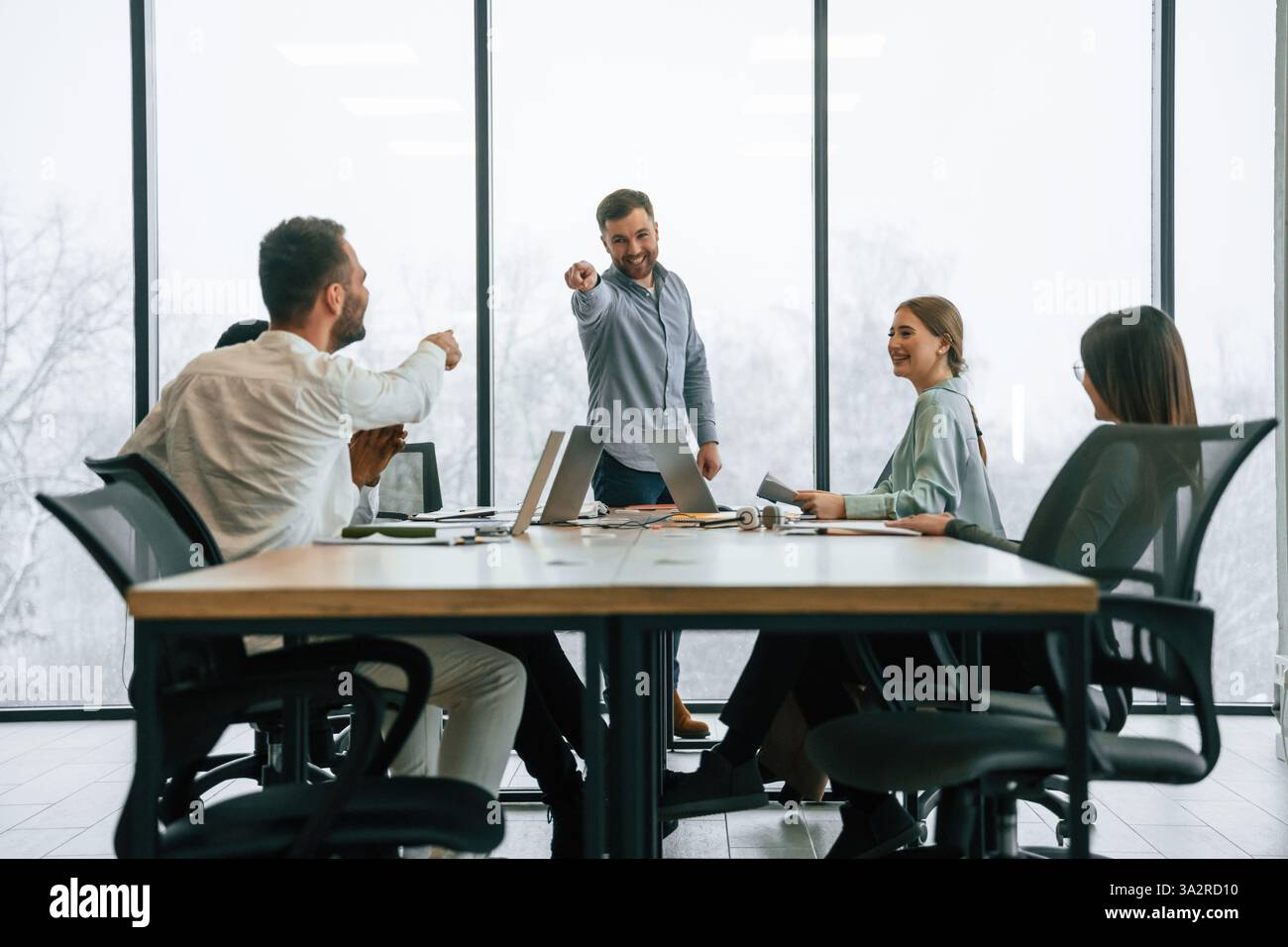 Success Workers Celebrating success, smiling. Team of office workers are together ...