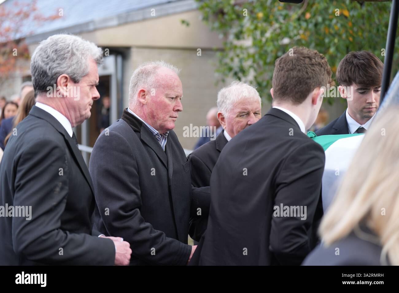 Conor Lenihan (centre left) leaving after the funeral of former Fianna ...