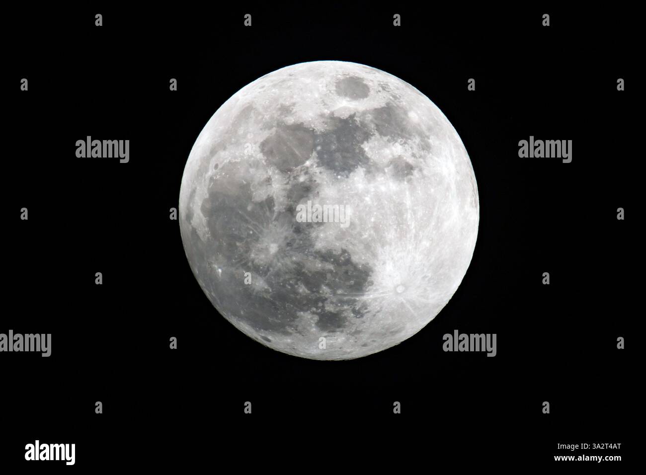 A full moon is seen in the evening sky in Berlin, Germany, on March 13, 2025. (Photo by