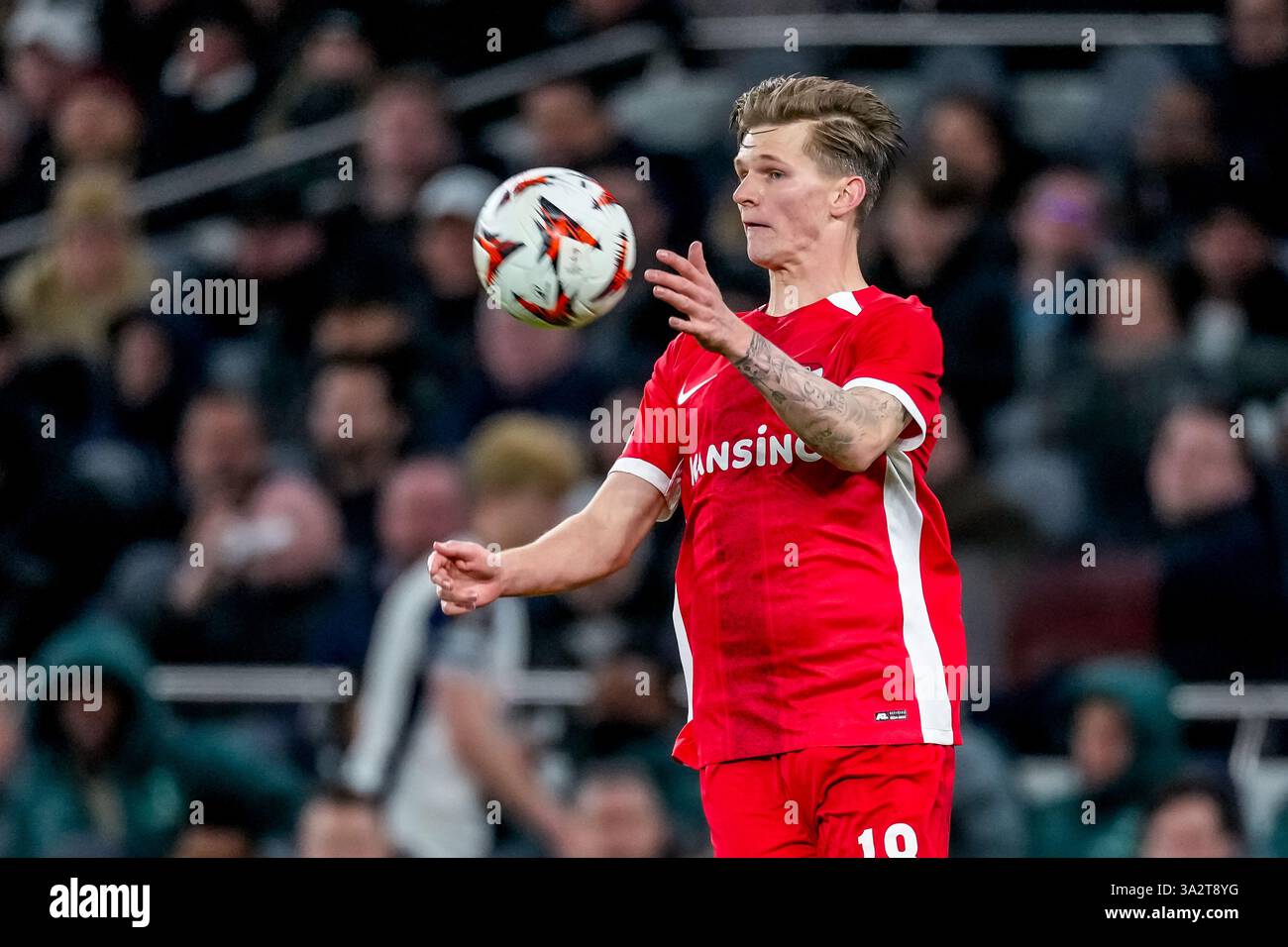 LONDON, ENGLAND - MARCH 13: David Møller Wolfe of AZ Alkmaar controlls ...