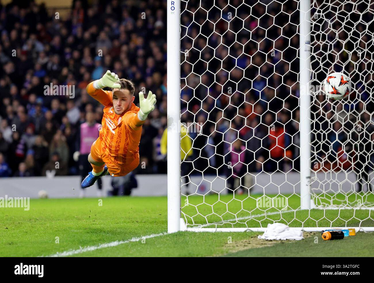 rangers-goalkeeper-jack-butland-dives-to-make-a-save-during-the-uefa