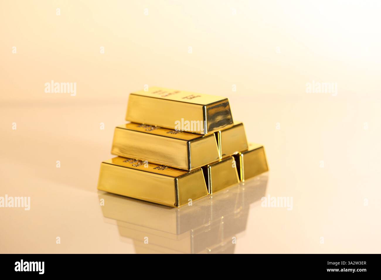 Many stacked gold bars on beige background, closeup Stock Photo - Alamy