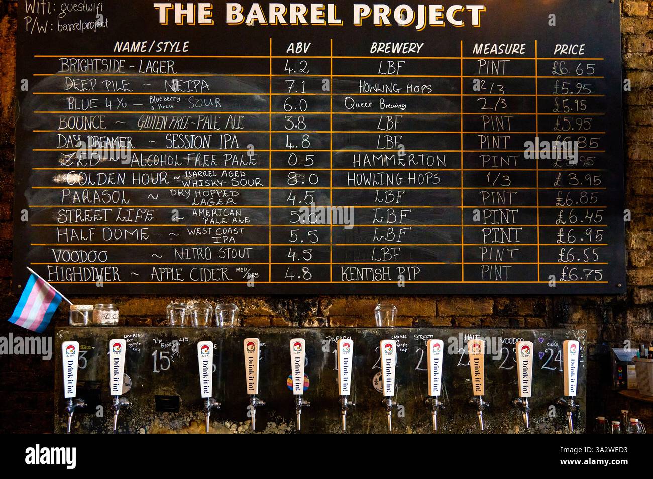 Drinks on sale are displayed on a board in the Barrel Project, a bar on the Bermondsey Beer Mile
