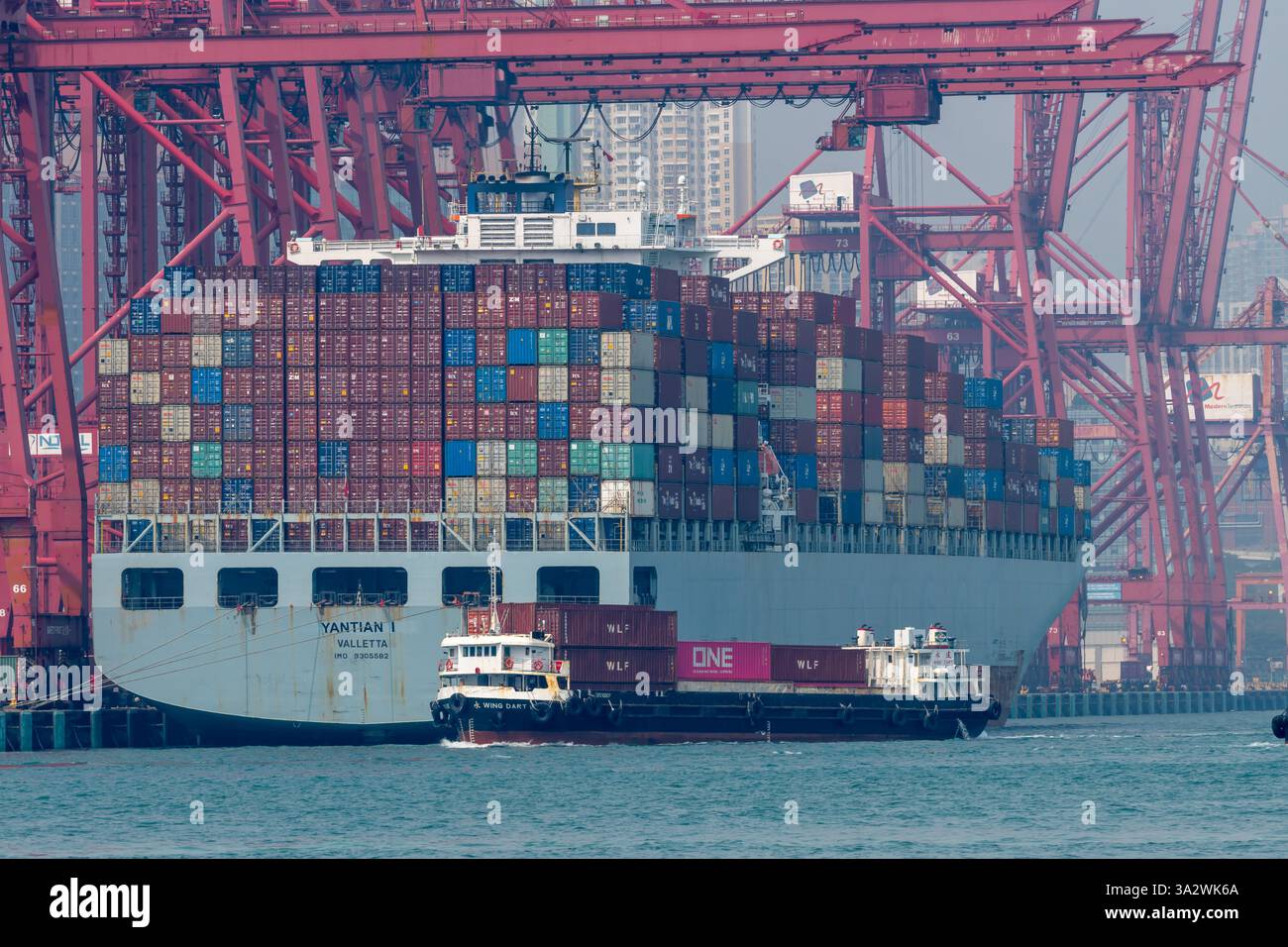 Hong Kong. China- 02.18.2025. Close up of a container cargo ship laden ...