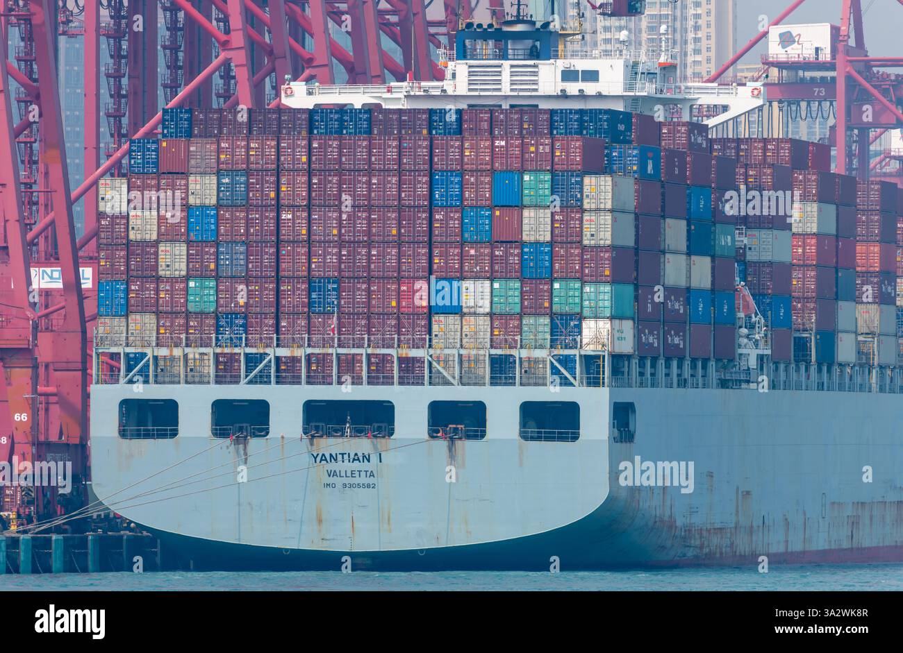 Hong Kong. China- 02.18.2025. Close up of a container cargo ship laden ...
