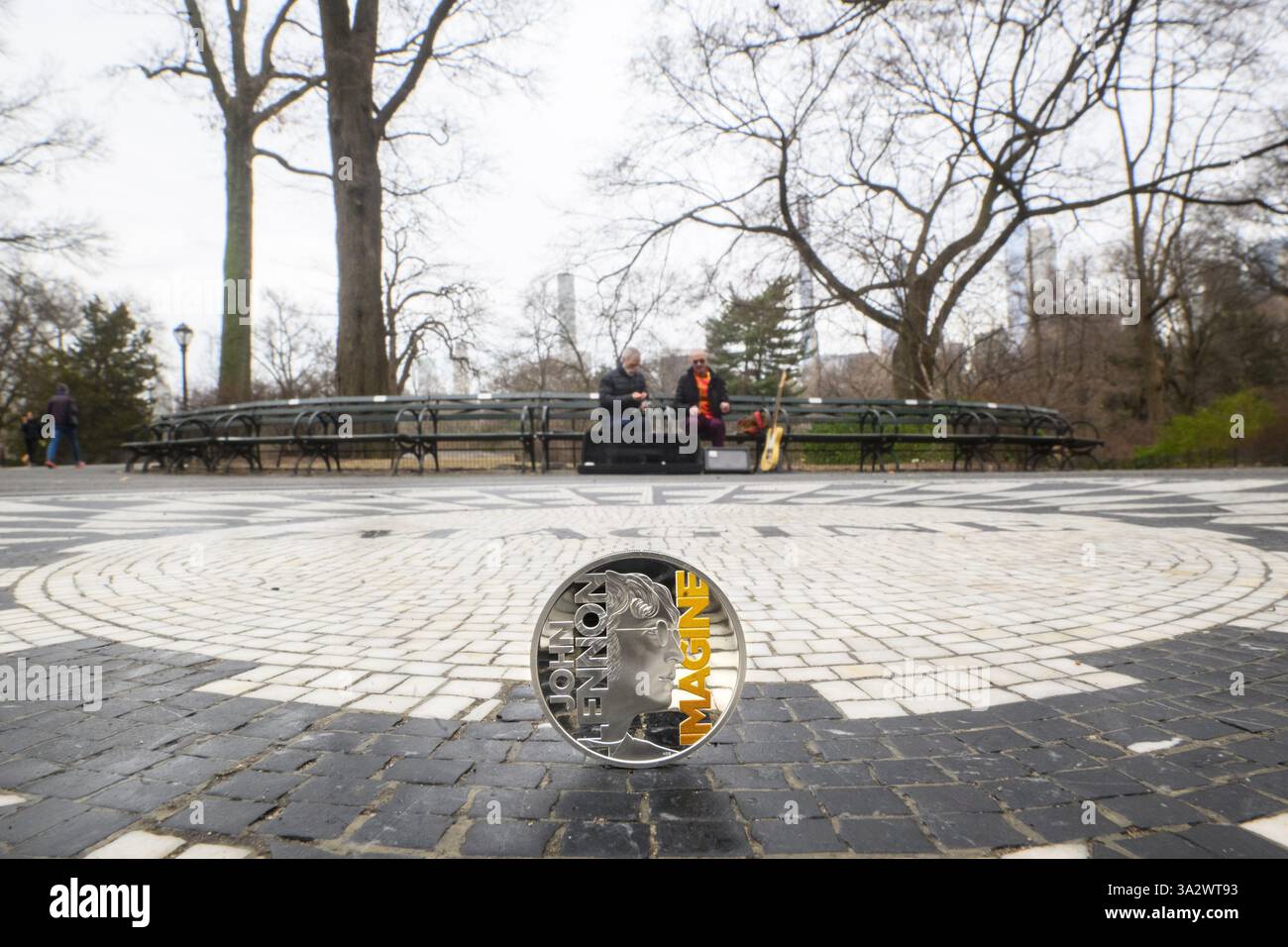 EDITORIAL USE ONLY A collectable coin featuring John Lennon and the ...
