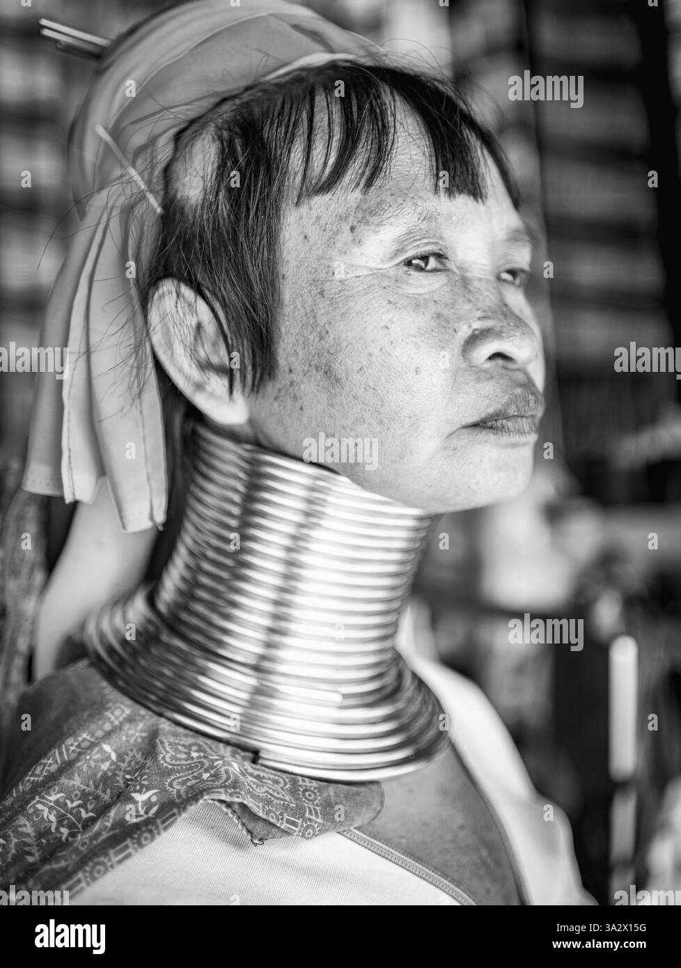 Pai District,Mae Hon Song,Thailand-February 16 2025:At the nearby ethnic village,Karen tribal women,native refugees from Myanmar,wear distinctive neck Stock Photo