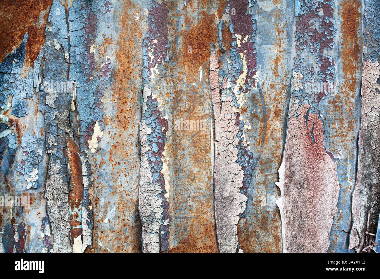 Pattern of peeling paint on rusty metal Stock Photo