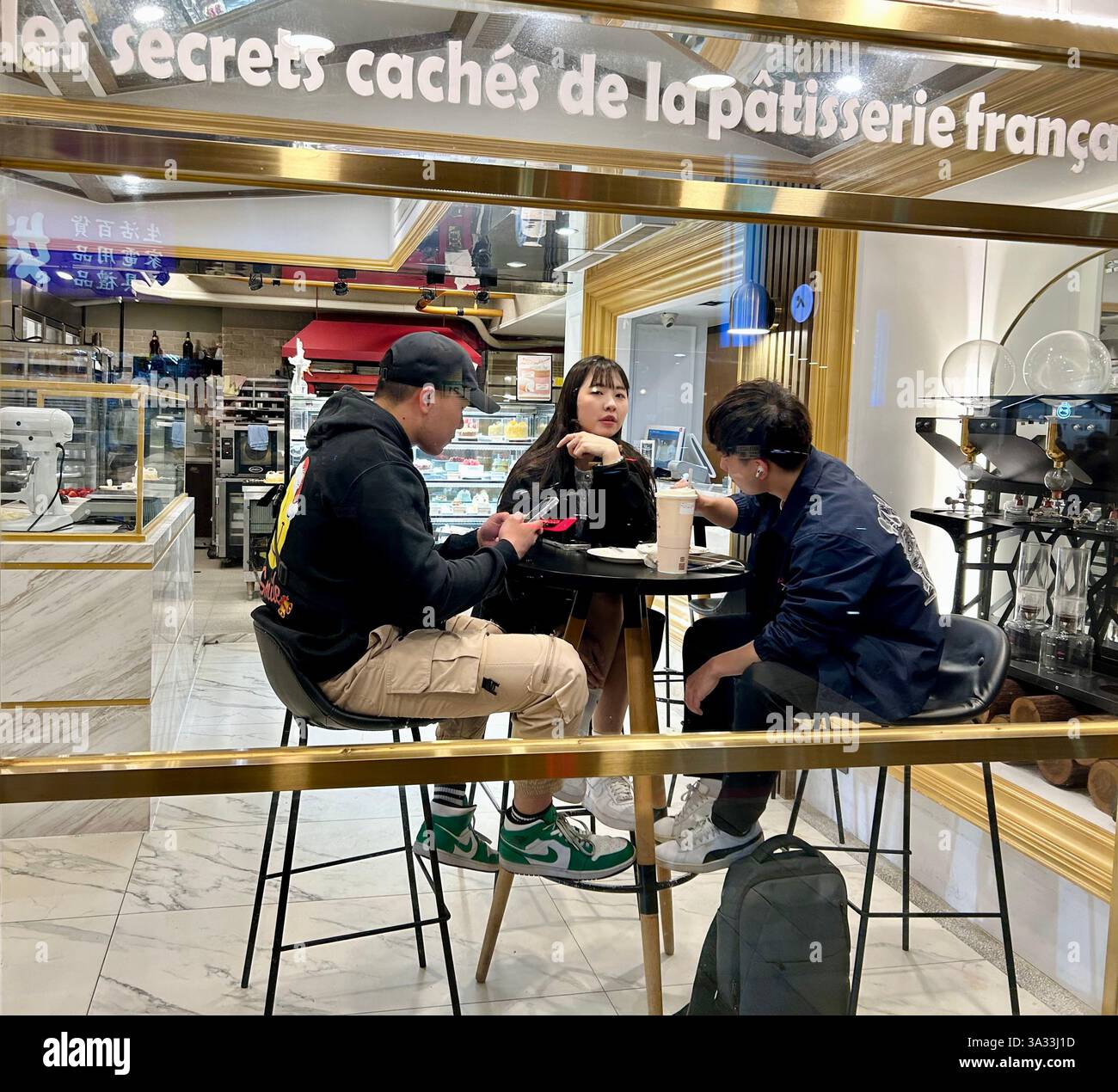 Taipei, Taiwan, Group People, Busy, Sharing Snacks, Outside French Patisserie Bakery Shop, Street Scene, Night, Dean Street, - Smartphone Captured Stock Image