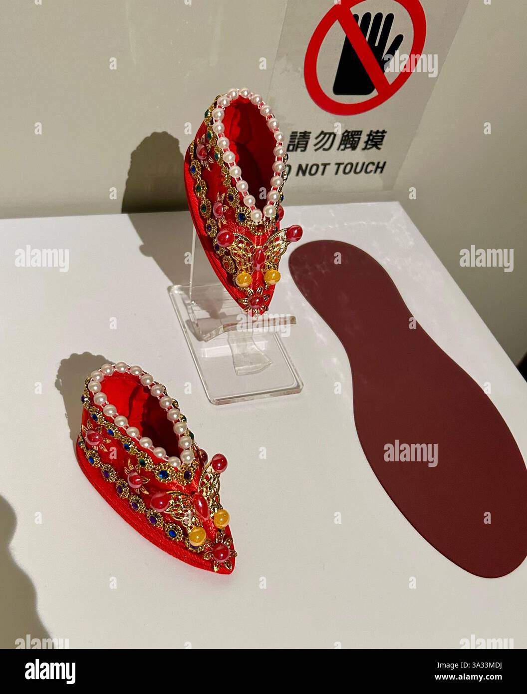 Taipei, Taiwan, Close up, Antique Objects, Chinese Art Collection, on Display,  National Museum, Asian Art Collection, Traditional WOman's Shoes, - Smartphone Captured Stock Image