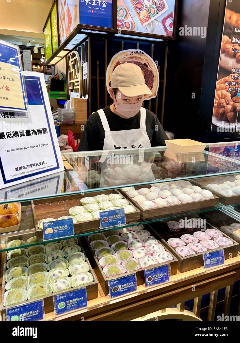 Taipei, Taiwan, Woman CLerk employees Working at Food Concession Shop People, Traveling, Scenes of Main Train Station, taiwan market - Smartphone Captured Stock Image