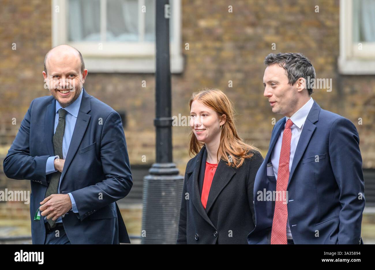 Joe Powell MP (Lab: Kensington and Bayswater), Helena Dollimore MP (Lab: Hastings and Rye) and Matthew Patrick MP (Lab: Wirral West) in Downing Street Stock Photo