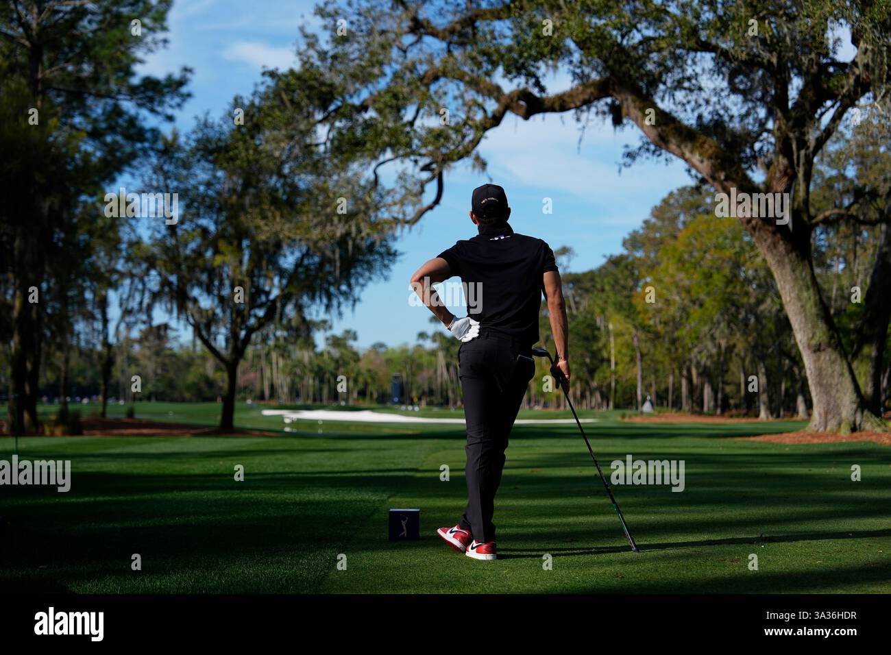 Camilo Villegas watches his tee shot on the sixth hole during the ...