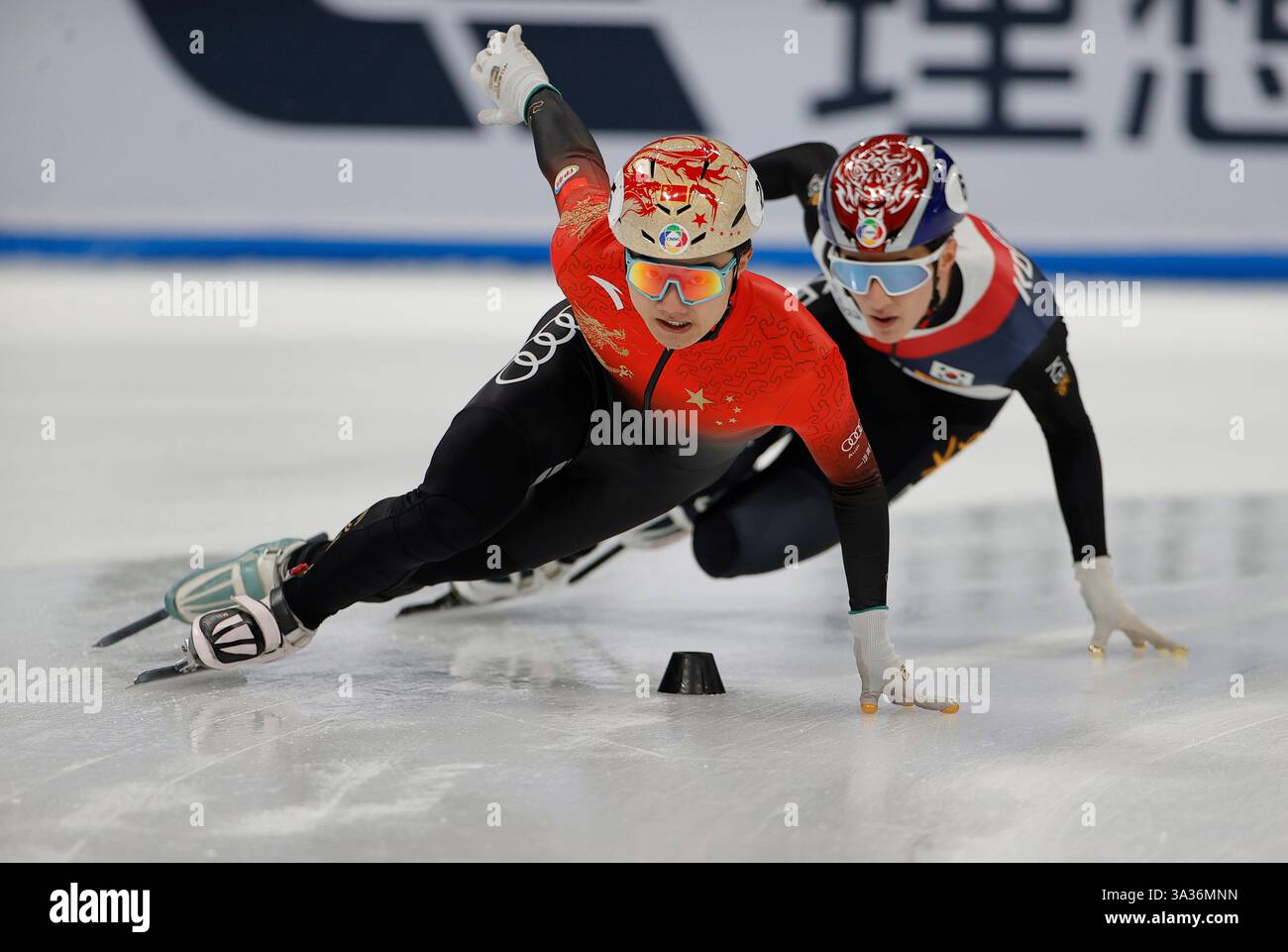 BEIJING, March 14, 2025 -- Li Wenlong (L) of China and Jang Sungwoo of ...