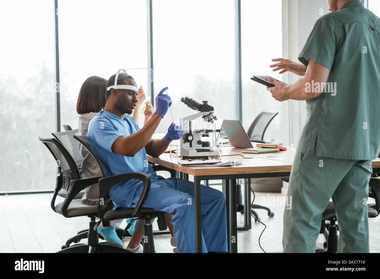 Scientific research. Group of doctors are together indoors Stock Photo ...