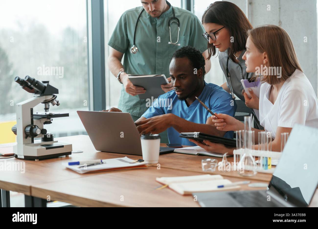 Scientific research. Group of doctors are together indoors Stock Photo ...