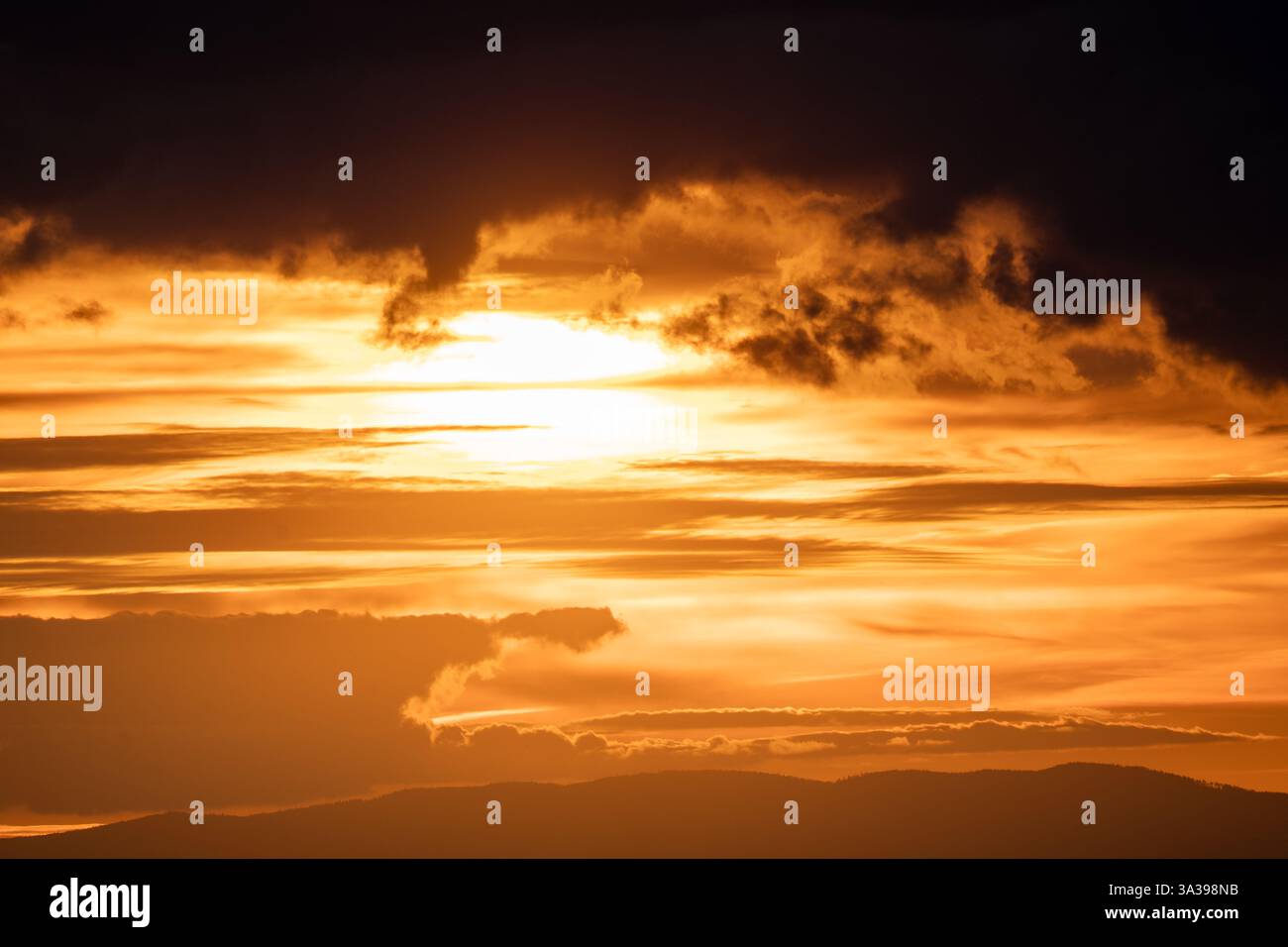 A Stunning Golden Sunset Casting its Glow Over the Dramatic and ...