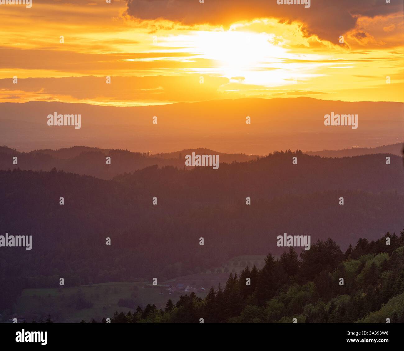 Experience the stunning beauty of a breathtaking sunset over rolling ...