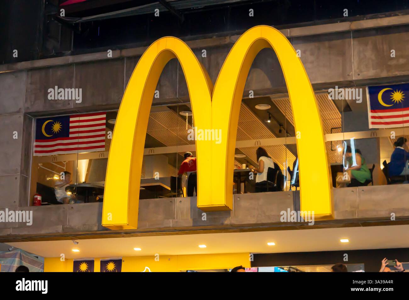 golden arches, the iconic logo of McDonald's, prominently displayed ...