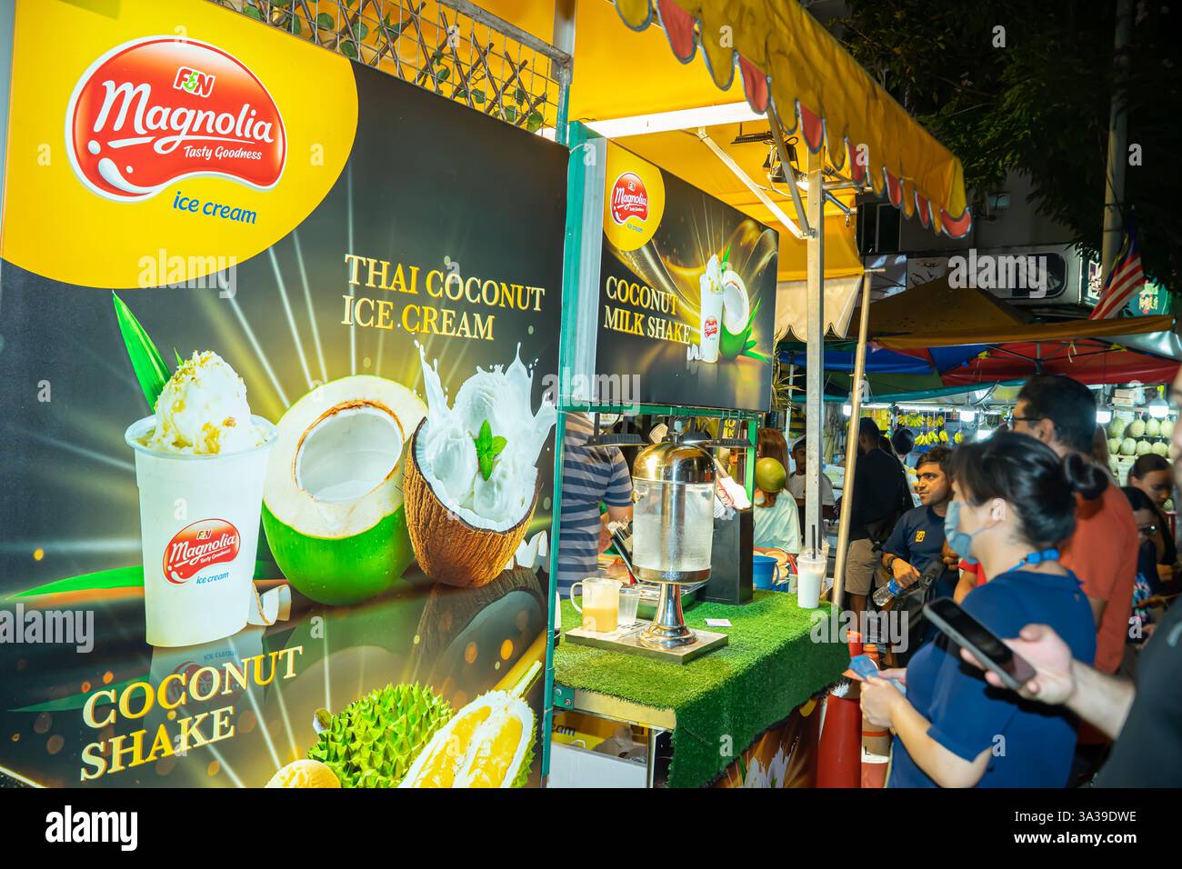 Magnolia Thai Coconut Ice Cream stand, Jalan Alor, a popular  street food avenue Kuala Lumpur Malaysia Stock Photo