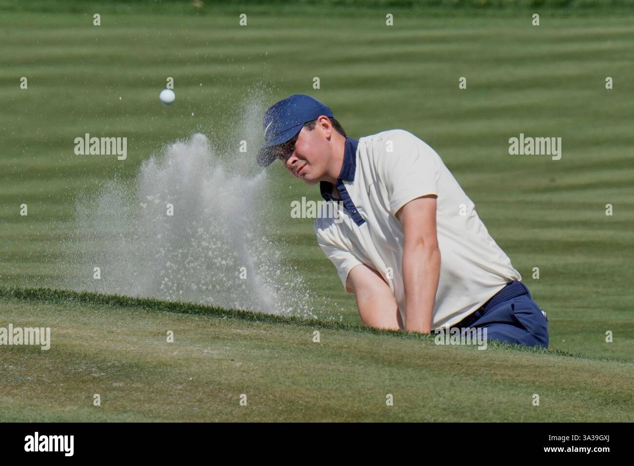 Davis Thompson hits out a bunker on the 11th hole during the second round of The Players