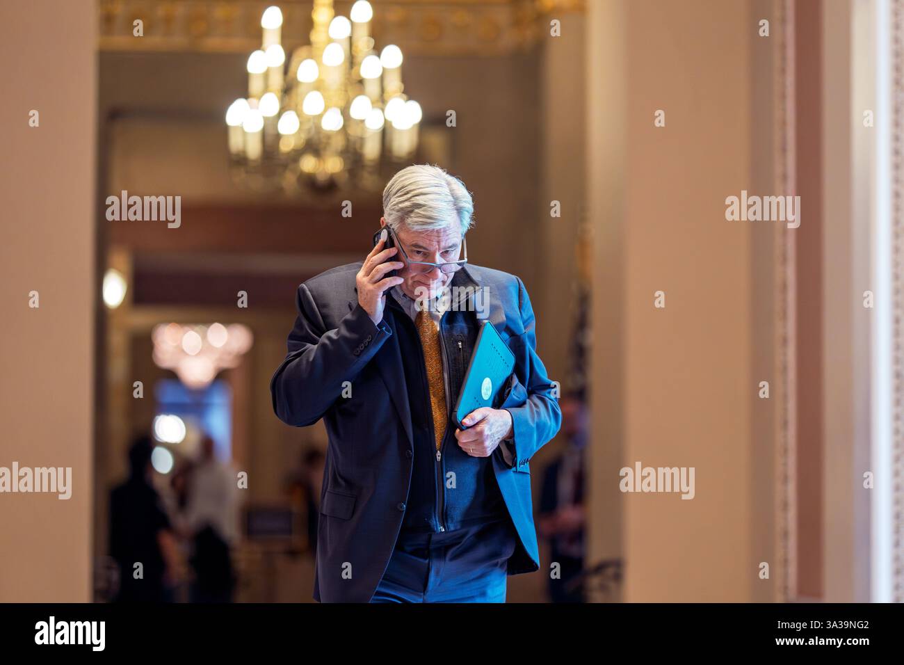 Sen. Sheldon Whitehouse, D-R.I., arrives for votes as the Senate works ...