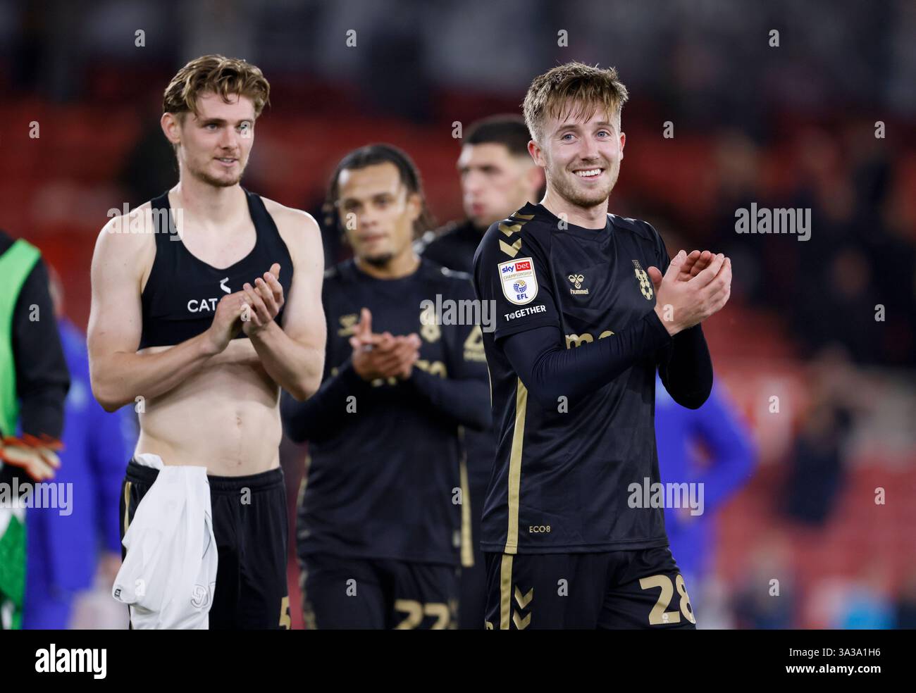 Coventry City's Jack Rudoni (left) and Josh Eccles (right) applaud the ...