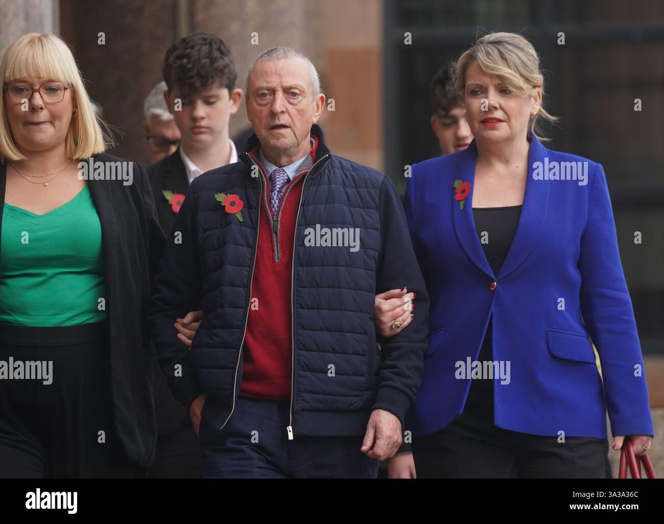 Patrick O'Hara (centre) and family members leave Newcastle Crown Court, in Newcastle, where Sunderland-based GP Dr Thomas Kwan, was sentenced to 31 years and five months after he attempted to murder Mr O'Hara, who was his mother's partner, with a poisoned fake Covid jab whilst disguised as a nurse. Picture date: Wednesday November 6, 2024. Stock Photo