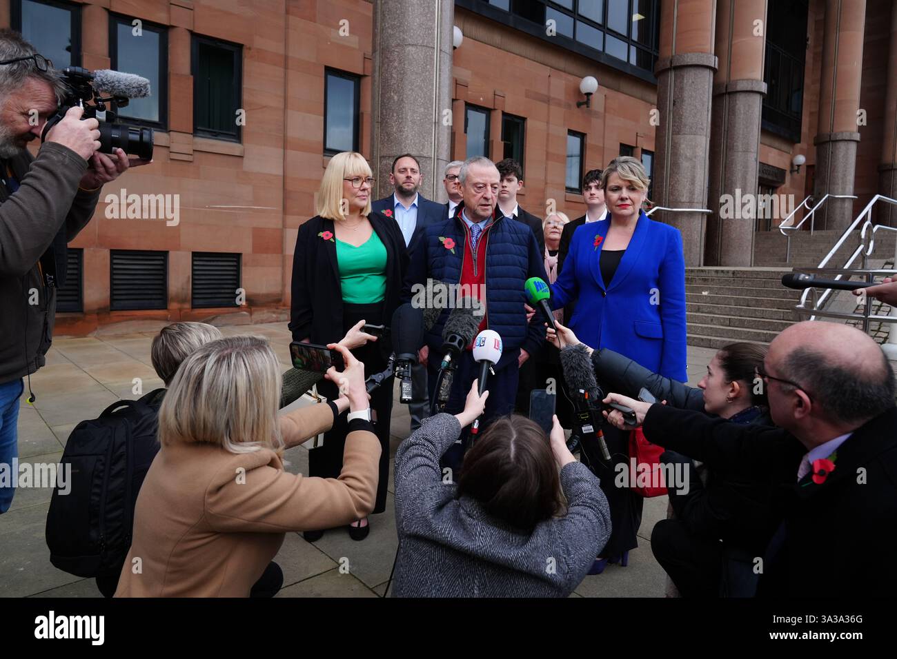Patrick O'Hara (centre) stands with family members as he speaks to the media outside Newcastle Crown Court, in Newcastle, where Sunderland-based GP Dr Thomas Kwan, was sentenced to 31 years and five months after he attempted to murder Mr O'Hara, who was his mother's partner, with a poisoned fake Covid jab whilst disguised as a nurse. Picture date: Wednesday November 6, 2024. Stock Photo