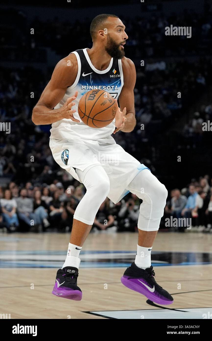 Minnesota Timberwolves center Rudy Gobert (27) dribbles down the court ...