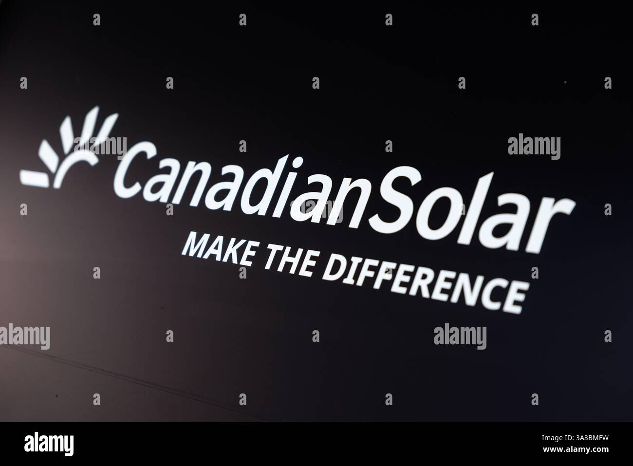 09 March 2025, Bavaria, Munich: The Canadian Solar logo with the slogan ...