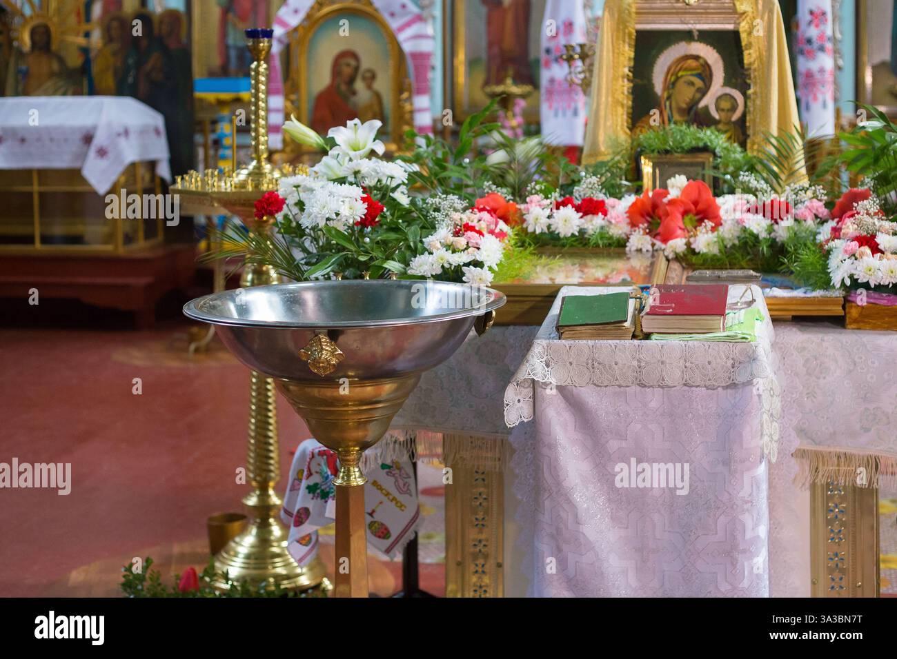 Baptismal candle on font hi-res stock photography and images - Alamy